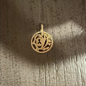 Gold “LOVE” Pendant